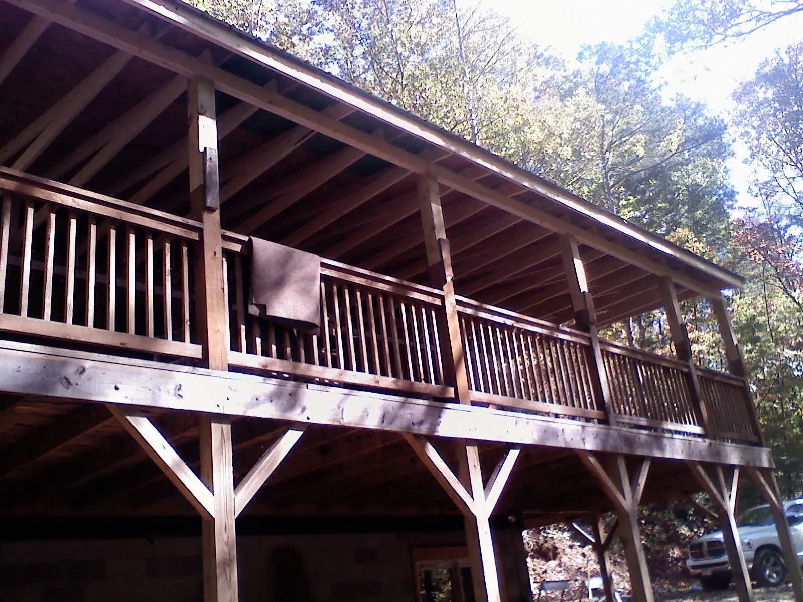 Timber framing under a new elevated porch and deck — Roof Leak Repair in Vancleave by Roofing Brothers
